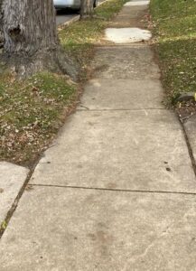 Sidewalk un-leveling with cracks