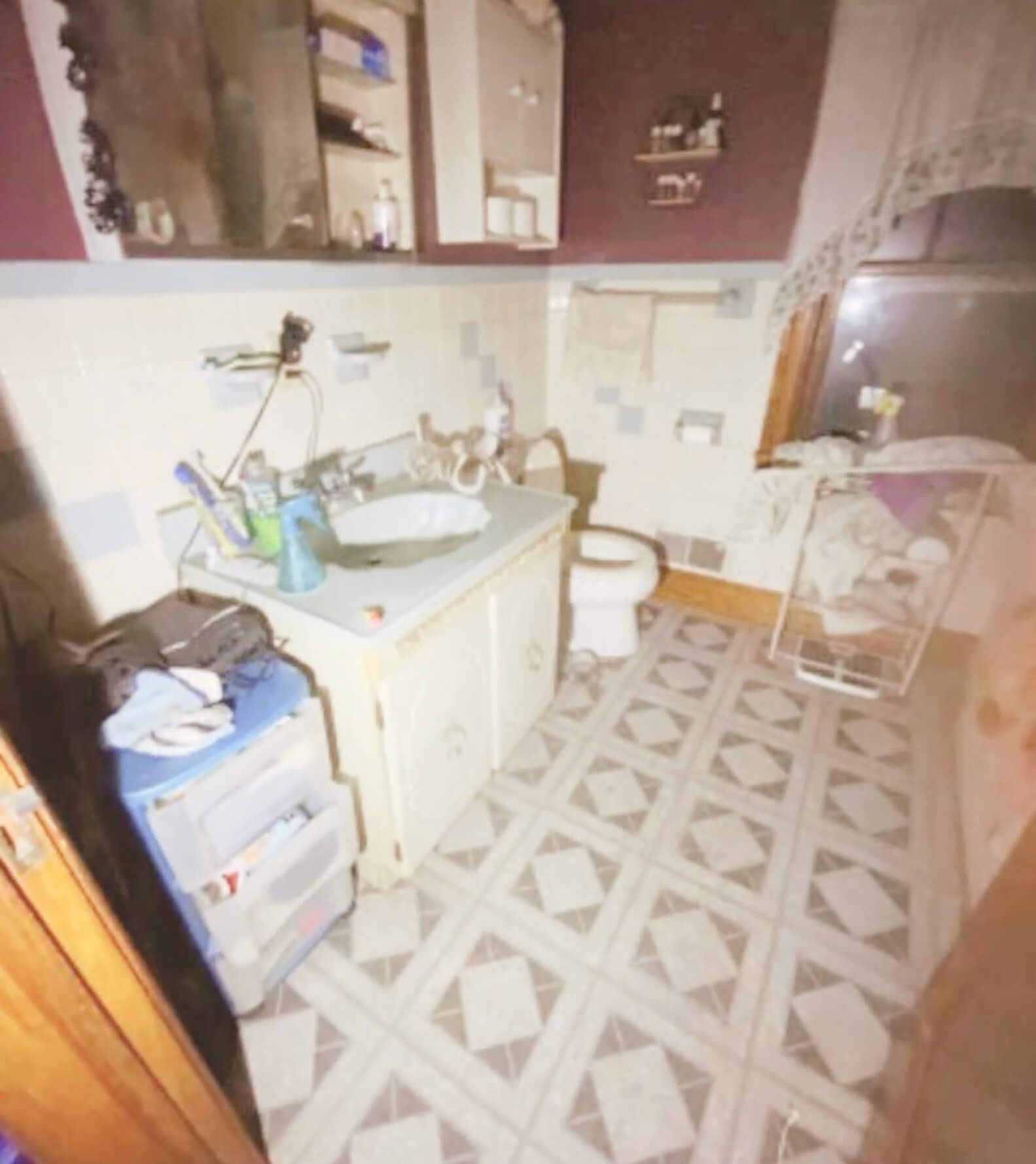 Bathroom BEFORE C.A.R.E. Property Services Inc. Fire Damage Restoration