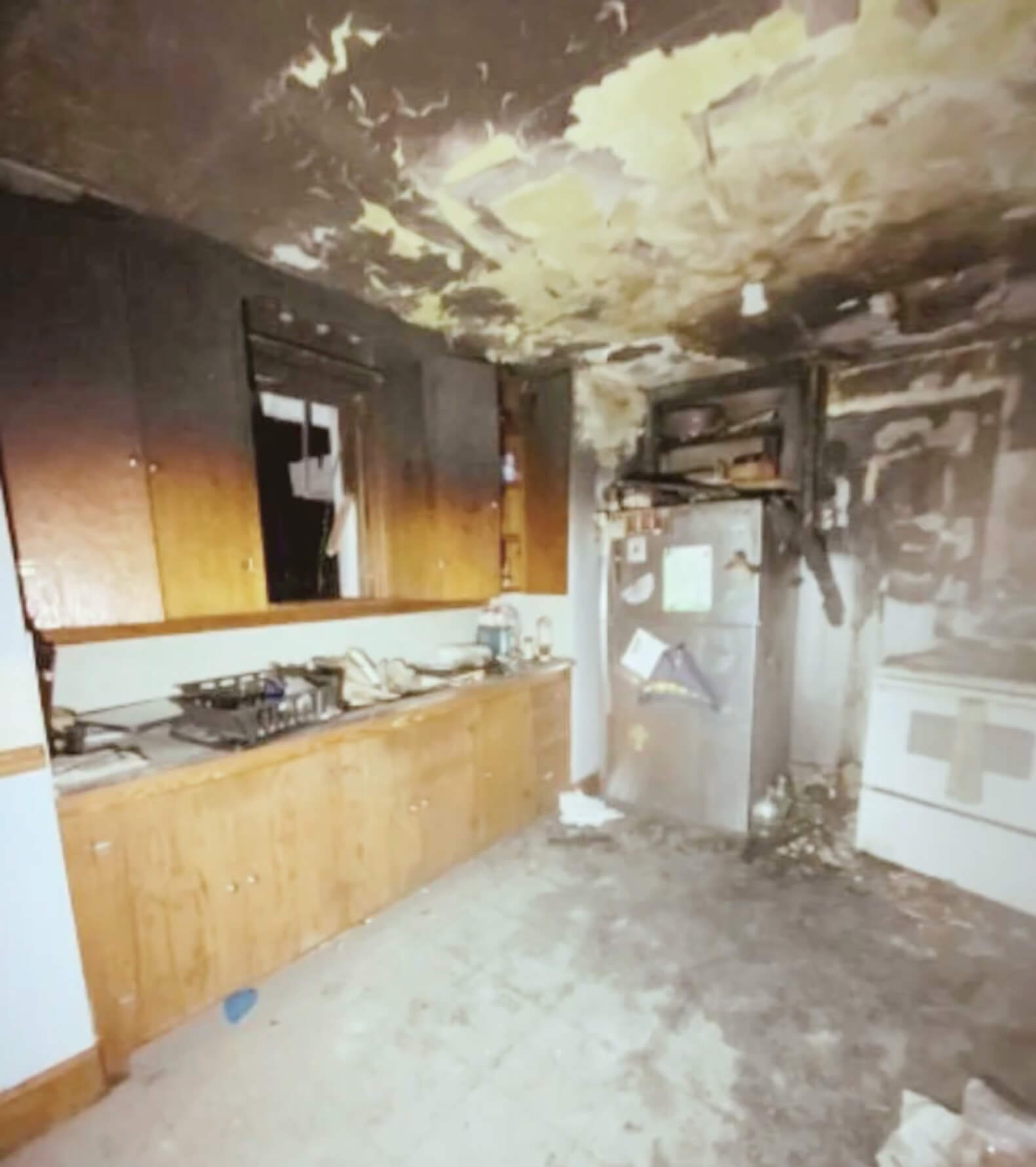 Kitchen BEFORE C.A.R.E. Property Services Inc. Fire Damage Restoration