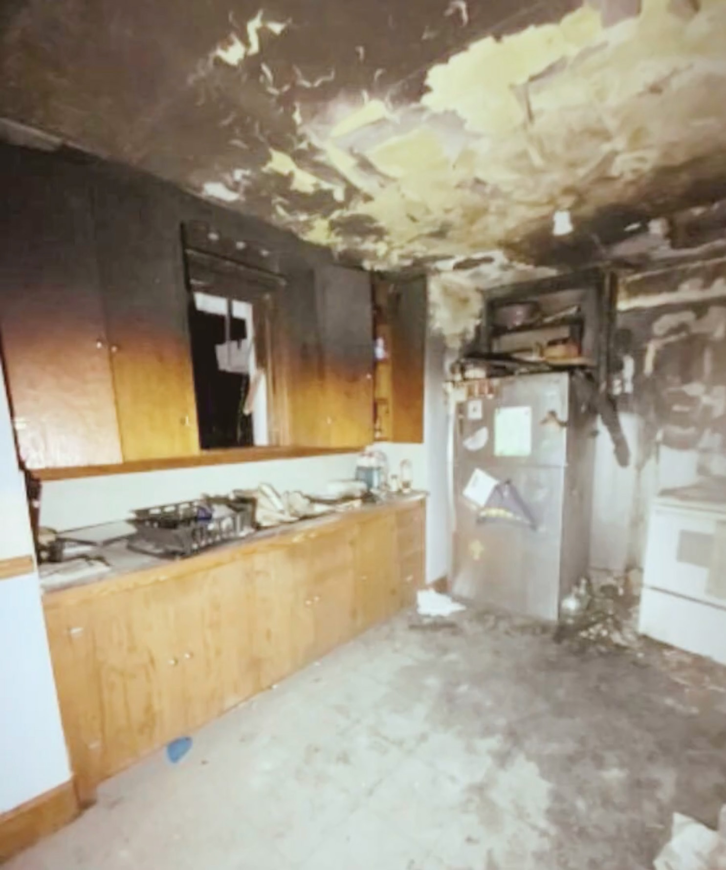 Kitchen BEFORE C.A.R.E. Property Services Inc. Fire Damage Restoration